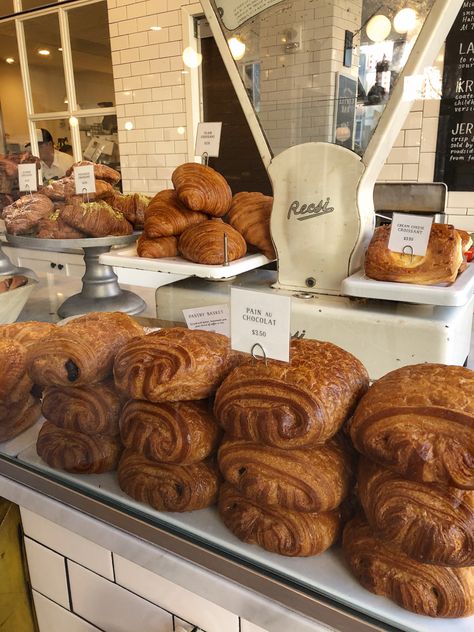 Image of an aesthetic coffee shop with rows of baked goods and chocolate croissants Muffins Aesthetic, Aesthetic Bakery, Coffee Shop Bakery, Aesthetic Coffee Shop, Invisible String, Cafe Aesthetic, Coffee Shop Aesthetic, French Bakery, Shop Aesthetic