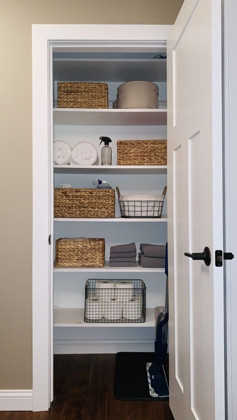 Closet Organization Open Shelves, Minimal Linen Closet, Baskets Linen Closet, Minimalism Closet Organization, Bathroom Storage No Closet, Baskets For Closet Storage, Bathroom Open Closet Ideas, Open Linen Closet Ideas, Linen Closet Decor