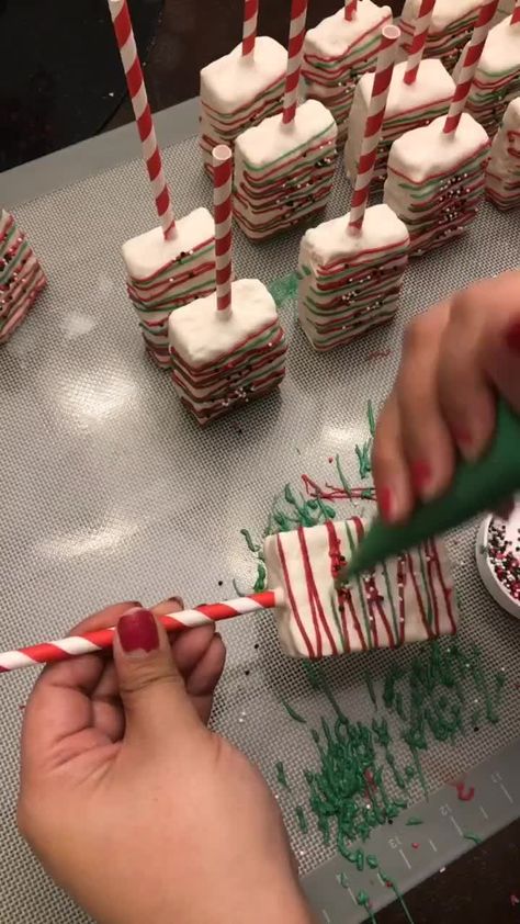 Teri Marie(@simplysprinkled) on TikTok: Easy Decorated Rice Krispy Treats #chocolate #ricekrispy #ricekrispytreats #fyp #christmas #foryoupage Rice Crispy Cakes Christmas, Christmas Treats On A Stick, Christmas Themed Rice Crispy Treats, Rice Krispie Recipes Christmas, Easy Christmas Rice Krispie Treats, Rice Crispy Dipped In Chocolate, Nutcracker Themed Treats, Desserts On Sticks, Christmas Chocolate Covered Rice Krispy