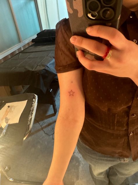 Small Tats Aesthetic, Enya Star Tattoo, Basic Star Tattoo, Star Aesthetic Tattoo, Green Star Tattoo, Star Tattoo Placement Ideas, Star Tattoo Back Of Arm, Brown Star Tattoo, Double Star Tattoo