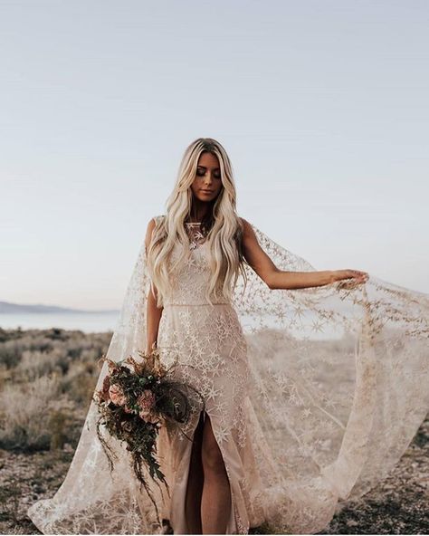 This impressive star gown is handmade in Portugal. You don’t have to be having a celestial themed wedding to embrace the beautiful ethereal pattern on this romantic, boho reception dress. For more wedding reception dress, from white to short to sequin to colourful - see Hitched's roundup! Wedding Dress With Split, Watteau Train, Gown With Cape, Western Wedding Dresses, Dress With Split, Wedding Reception Dress, A Wedding Dress, Mini Robes, Reception Dress