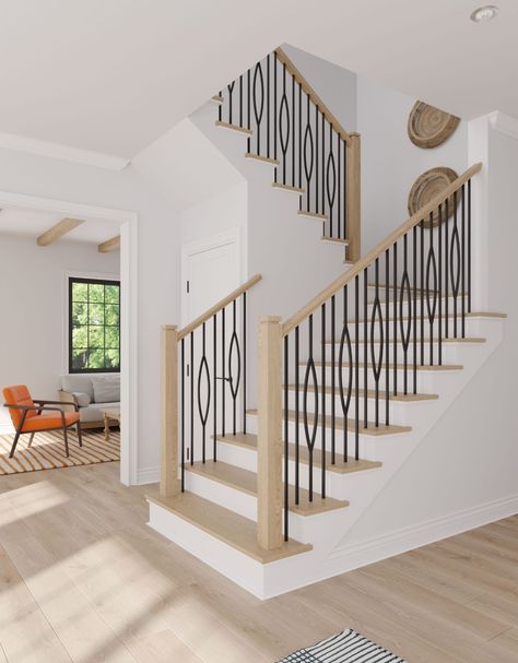 Requests for iron balusters, combined with wooden handrails and treads, continue as a strong trend in the industry. With this trend on the rise, L.J. Smith introduced new iron balusters that freshen up the look of your stairs from the traditional twist and basket look that has been around since the iron movement began. - Read more on the blog: https://www.ljsmith.com/blog/stair-product-trends-2022 - #LJSmith #StairExperts #StairTrends #IronBalusters #StaircaseDesign Stair Balusters, Wood Railing, Steel Stairs, Iron Balusters, Metal Stairs, J Smith, Interior Design Elements, House Stairs, Stair Railing