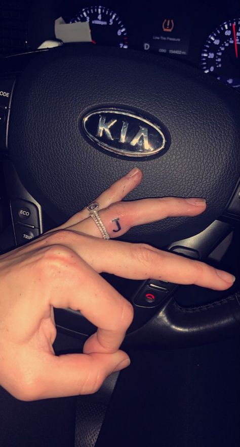 Letter Ring Tattoo Initials, J Tattoo Ring Finger, Finger Tattoos For Couples Initials, Finger Tattoos Ring Finger Tattoo, Husband Name Tattoo On Ring Finger, Finger Tattoos With Initials, Letter J Tattoo Finger, J On Ring Finger Tattoo, J On Finger Tattoo