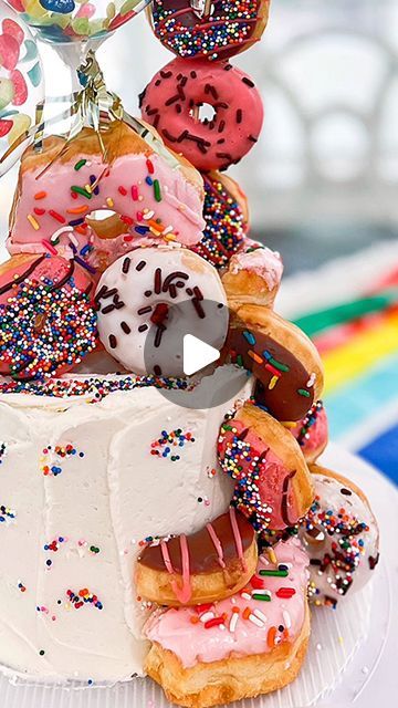 Ashley Klaja on Instagram: "It’s NATIONAL DONUT DAY!!! Here’s your sign to go out and get all the donuts you want because the calories won’t count today 😉 This is a cake I made with actual donuts in the middle. Perfect for all the donut lovers! #nationaldonutday #donutcake #sprinkledonut #donut #donutday" Donut Platter, Donut Hole Cake, Donut Day, Donut Bar, National Donut Day, Sprinkle Donut, Donut Holes, Cake Donuts, Go Out