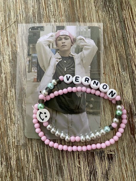 Bracelets + Lomo card. Inspired by Kpop Seventeen Vernon with acrylic beads mixed beads, fimo smiley and letter beads. Good to know : *Discoloration of skin or jewelry This has nothing to do with cheap materials, but with all kinds of other factors. *What causes it? Metal (often an alloy of several types of metal) and real silver can discolour or discolor the skin due to: - perfume or cosmetics (particularly substances such as calamine, zinc oxide, titanium dioxide and electrolytic oxide) - wate Kpop Jewelry, Bts Bracelet, Pop Jewelry, Seventeen Vernon, Kpop Seventeen, Lomo Card, Zinc Oxide, Titanium Dioxide, Letter Beads