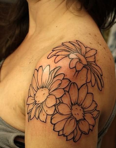 Among the flower tattoos, daisy designs have the most colorful patterns. You can find daisy tattoos of various colors by many people. Daisy Tattoo Designs, Flower Tattoo On Side, Sunflower Tattoo Shoulder, Daisy Tattoo, Flower Tattoo Shoulder, Flower Tattoo Sleeve, Sunflower Tattoos, Side Tattoos, Sunflower Tattoo Design