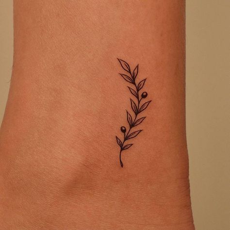 Olive Branch Tattoo Ideas, Olive Branch Heart Tattoo, Branch Wrist Tattoo, Olive Branch Tattoo Finger, Olive Branch Tattoo Behind Ear, Fineline Olive Branch Tattoo, Tattoo Olive Tree, Olive Branch Tattoo Minimalist, Olive Branch Outline Tattoo