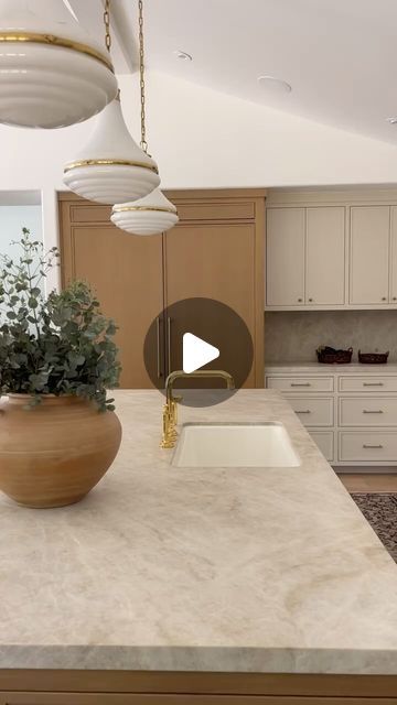 Morgan Mullen on Instagram: "COMMENT - PAINT -- ill send you the stain and paint details 

Our client didn't want a white kitchen, so we spent months playing with stains and paint to get this space just right. 

Adding in a natural quartzite stone counter, brass details and a whole lot of styling to create one of my favorite spaces yet ✨" Denali Quartzite Countertops, Quartize Stone, Taj Mahal Quartzite Bathroom, Calcutta Quartzite, Tan Mahal Quartzite Kitchen, Taj Mahal Quartzite Countertops Kitchen, Taj Mahal Quartzite Kitchen, Granite Countertops With White Cabinets, Vermont Kitchen