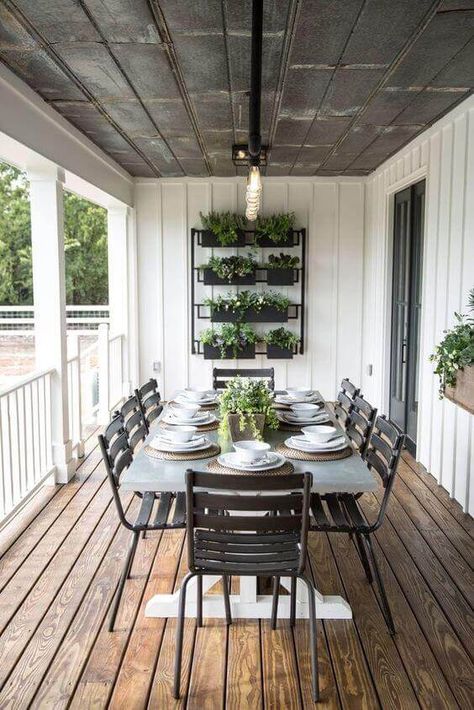 These simple back porch ideas will have you loving your minimalist porch because we did go for the coziest and warmest felt ideas. Go to backyardmastery.com for more ideas. Stile Joanna Gaines, Balkon Decor, Magnolia Market, House With Porch, Patio Interior, Porch Design, Iron Lighting, Magnolia Homes, Cool Ideas