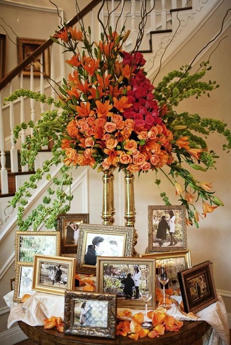 entrance table with pictures and flowers - good as a guest book area Memory Table, Stair Case, 50th Wedding Anniversary, 50th Wedding, Table Flowers, Anniversary Party, Ikebana, Photo Displays, Celebration Of Life