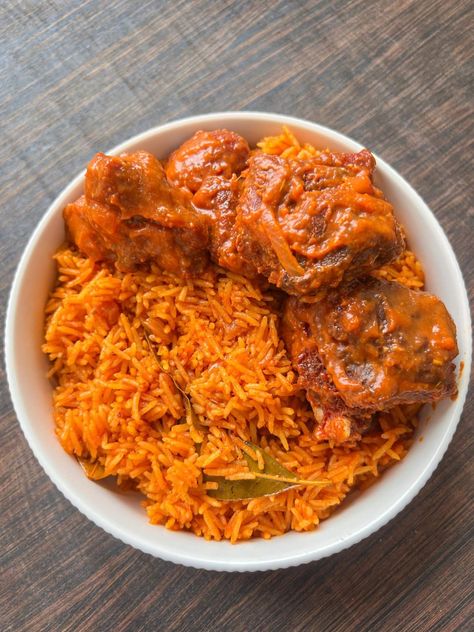 Explore the streets of Nigeria with this authentic Jollof Rice recipe. Bursting with flavors, this Nigerian dish is a delight for both meat lovers and fans of African food. Learn how to cook this easy rice recipe to create a balanced and delicious meal. Whether you're hosting a dinner party or craving a weeknight dinner, this recipe will become a staple in your kitchen. Enjoy the rich traditions of West African cooking. African recipes Nigerian food, West African foodrn Party Jollof Rice Nigerian, Nigeria Food Recipes How To Cook, African Dishes Nigerian Food, Rice And Turkey, Jollof Rice Nigerian, Naija Babe, Nigerian Meals, Nigerian Jollof Rice, Jollof Rice Recipe