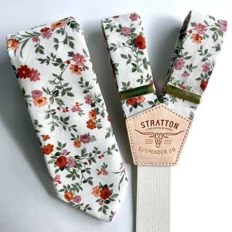 Check out our new line of Wedding Suspender straps in Red Wine, Burnt Orange, Copper, Cinnamon, Espresso, Shale, Charcoal Yarn Dyed, Pepper and the MOST beautiful fall floral you have ever seen! - Simply message Jacqueline and let her know any color or pattern Suspender/Tie color you like and we make each set custom for YOUR Wedding. - Simply message Jacqueline and let her know any color or pattern Suspender Tie you like and we make each set custom for YOUR Wedding. Button On Color Attachments a Suspenders With Tie, Floral Tie Groom, Groomsman Attire, Floral Tie Wedding, Wedding Suspenders, Grooms Suit, Suspenders Wedding, Bridal Party Outfit, Orange Copper