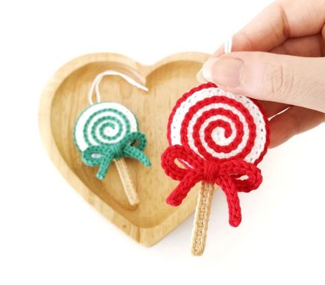 Crochet Lollipop, Peppermint Ornament, Ornament Crochet, Crochet Christmas Ornaments Free, Mini Christmas Stockings, Crochet Knit Sweater, Paw Print Ornament, Crochet Ornament Patterns, Christmas Crochet Patterns Free