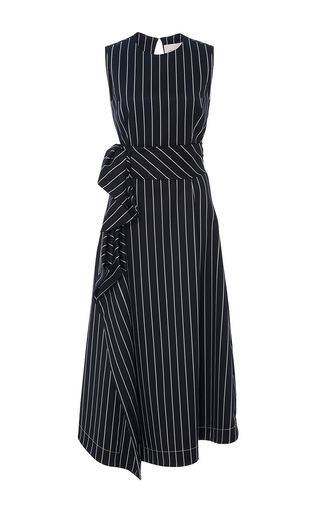 This **Carolina Herrera** dress features a pinstriped design, a jewel neckline, and a midi length hemline. Carolina Herrera Dress, Carolina Herrera Dresses, Upscale Fashion, Pinstripe Dress, Classy Dress Outfits, Anime Dress, Modest Wear, Jewel Neckline, Long Dress Casual