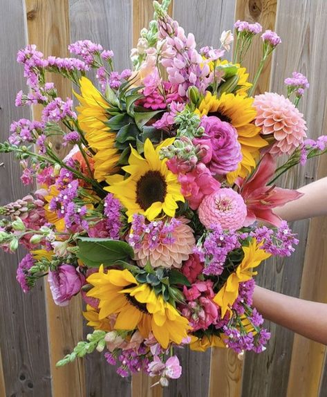 Sunflower And Pink Bouquet, Sunflowers And Pink Flowers, Purple And Yellow Bouquet, Purple And Yellow Bridal Bouquet, Yellow And Purple Flower Arrangements, Purple Yellow And White Bouquet, Pink Purple Yellow Wedding Bouquet, Purple Colour Flowers, Garden Wedding Cake