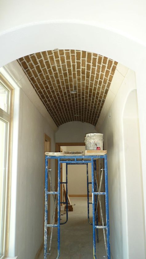 brick barrel-vaulted ceiling.  Our klompie colouring is more terracotta, but would look just as awesome against the white walls Brick Vaulted Ceiling, Brick Ceiling, Bathroom With Barrel Ceiling, Barrel Vault Ceiling Living Room, Brick Barrel Ceiling, Barrell Ceilings Bathroom, Barrel Vault Ceiling Hallway, Bar Nook, Barrel Vault Ceiling