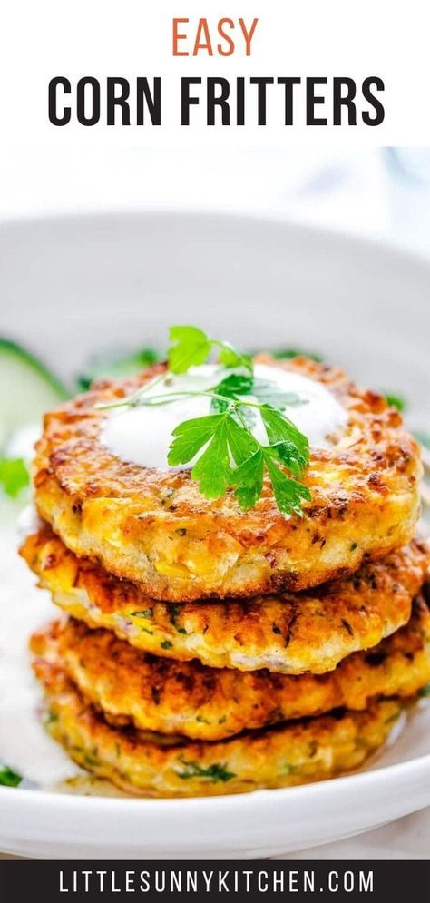 These crispy corn fritters served with cucumber parsley salad and yogurt sauce are bursting with flavor! They make a hearty dinner, breakfast or even snack! Amazing with fresh corn, but easily made with frozen corn as well! #cornfritters #corncakes # Baked Corn Fritters, Corn Fritters Recipe, Vegetable Bake, Corn Fritter Recipes, Veggie Fritters, Little Sunny Kitchen, Ww Food, Parsley Salad, Best Lunch Recipes