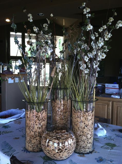 Buffet table centerpieces for Lindsey's shower. I was particularly liking the animal crackers as a filler in the containers. Such a subtle touch for a jungle-themed party. Rainforest Baby Shower Theme, Baby Boy Shower Ideas Themes, Animal Centerpieces, Baby Shower Ideas For Boys Themes, Boy Shower Ideas, Baby Boy Shower Ideas, Baby Shower Ideas For Boys, Animal Cracker, Jungle Safari Baby Shower