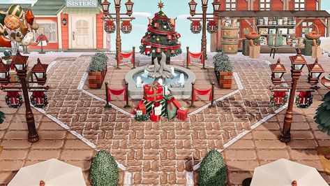 Acnh Christmas Neighborhood, Acnh Christmas Flowers, Acnh Christmas Toy Shop, Acnh Christmas Entrance Ideas, Christmas Acnh Island, Acnh Holiday Design, Acnh Main Street Ideas, Acnh Christmas Entrance, Acnh Circle Neighborhood