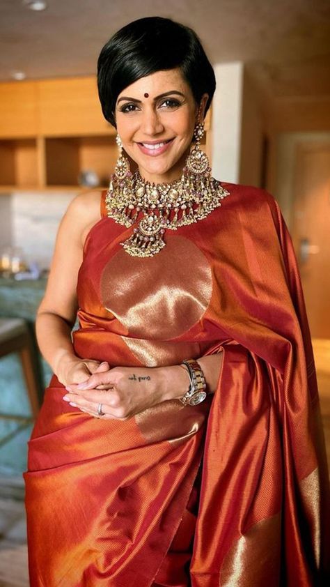 12 Trendy Chic Saree Looks of Mandira Bedi For 2024 Closet Mandira Bedi, Saree Looks, Net Blouses, Sore Eyes, Simple Sarees, Orange Ombre, Black Drapes, High Neck Blouse, Black Saree