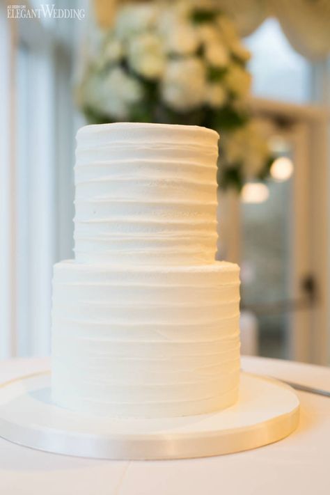 Classic All White Wedding Inspiration | ElegantWedding.ca Simple White Tiered Cake, Plain Two Tier Cake, Simple White 2 Tier Wedding Cake, Plane White Wedding Cake, 1 Tier Wedding Cakes Simple, Two Tiered White Cake, Simple Piped Wedding Cake, Plain White Two Tier Cake, White Cake 2 Tier