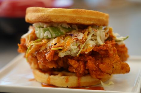 Nashville Hot Chicken and Waffle Sandwich | Allrecipes Nashville Hot Chicken And Waffles, Chicken And Waffles Sandwich, Waffle Chicken Sandwich, Waffle Sandwich Ideas, Waffle Creations, Waffle Restaurant, Stuffed Waffles, Waffle Ideas, Cowboy Food