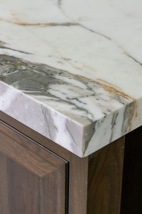 Calacatta Vintage Quartz Kitchen Countertops, Grey And Gold Granite Countertops, Gold Veining Quartz, Quartz Countertop That Looks Like Marble, Quartz Gold Countertops, Different Quartz Countertops, Kitchen Marble Design Counter Tops, Gray Veined Quartz Countertops, Calcutta Gold Marble Countertops