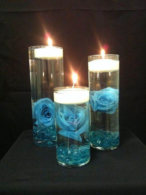 How To Create A Floating Rose Centerpiece - Garden Roses Direct Blue Candle Centerpieces, Blue Floating Candles, Floating Candle Centerpieces, Candle Wedding Decor, Teal Wedding, Turquoise Wedding, Wedding Centerpieces Diy, Blue Candles, Wedding Table Decorations