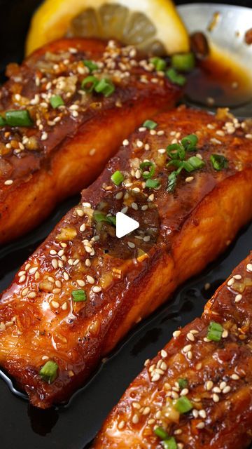 Yu Mon Khin on Instagram: "The best tastiest honey garlic butter salmon recipe with a handful of simple ingredients! Do you love easy fish recipes? Finding a quick and delicious way to cook salmon? Try this family's favourite pan seared salmon with sweet, garlicky, savoury and a hint of lemon sauce.  📃 Ingredients ▢3 fillets Salmon boneless skinless ( about 180 g/ 7oz each fillet) ▢¼ tsp Salt ▢¼ tsp Black pepper fresh ground ▢2 tbsp Butter unsalted ▢1 tbsp Garlic fine chopped ▢1 tsp Lemon zest Sauce ▢3 tbsp Honey ▢2 tbsp Soy sauce ▢2 tbsp Lemon juice fresh squeeze Garnish ▢Toasted sesame seeds ▢Spring onions chopped ▢Lemon wedges  #salmonrecipe #quickrecipe #salmon #quickdinner" Honey Garlic Butter Salmon, Cook Salmon, Honey Garlic Salmon, Garlic Butter Salmon, Butter Salmon, Easy Fish Recipes, Pan Seared Salmon, Seared Salmon, Spring Onions