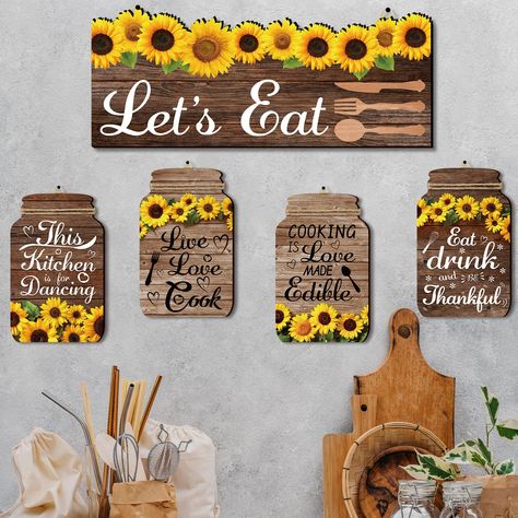 PRICES MAY VARY. ✔️【KITCHEN SIGNS】You will receive 5pcs sunflower kitchen decorations with hemp ropes, including 4pcs 5" × 8" mason jar and 1pc 5.4" × 12" rectangular shaped wooden board, enough to meet your decorative needs. ✔️【SUNFLOWER DESIGN】The kitchen wooden decor is printed with 3D vivid sunflower patterns and classic kitchen terms like "Let's Eat", "Eat, drunk, and Thankful" and more, matching with the kitchen-themed mason jar shape, which can bring much fun to your home. ✔️【PREMIUM MATE Kitchen Wall Decorations, Sunflower Stuff, Sunflower Mason Jar, Sunflower Themed Kitchen, Rustic Wooden Signs, Sunflower Home Decor, Sunny Kitchen, Sunflower Kitchen Decor, Tapestry Quotes