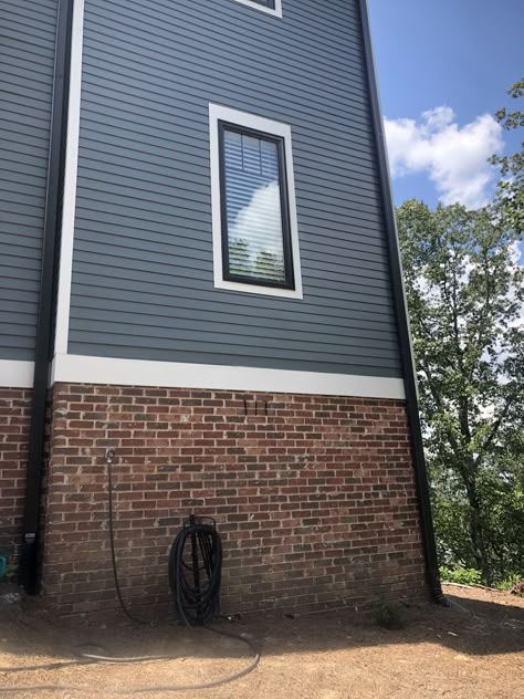 Red Black Brick House Exterior, Grey House Fence Color, Dark Grey Siding With Red Brick, House Siding With Red Brick, Black Gutters Red Brick House, 70s Farmhouse, Best Exterior Paint Colors, Orange Brick Houses, House Gutters