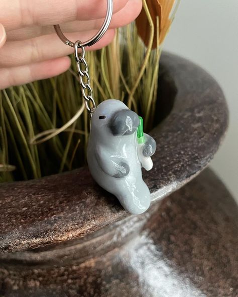 Guess what animal this is 🙈 . . . . . . #manatee #animal #totemanimal #leek #keychain #cuteanimal #polymerclay #polymerclayart #sculpey… | Instagram Polymer Clay Manatee, Clay Manatee, Manatee Jewelry, Clay Keychain, Manatees, Clay Crafts Air Dry, Clay Animals, Cute Clay, Clay Art Projects