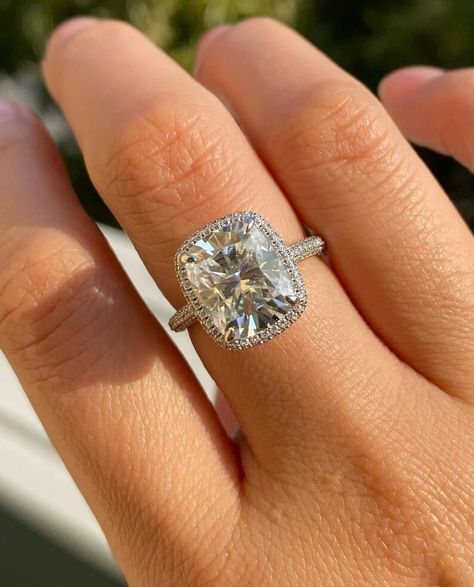 3.63 Ct Cushion Cut Moissanite Engagement Halo Ring, Classic 4 Prongs Ring, Unique Solitaire Ring, Bridal Ring, Proposal Ring, & Hidden Halo ♻︎𝐃𝐢𝐚𝐦𝐨𝐧𝐝 𝐃𝐞𝐭𝐚𝐢𝐥𝐬 ⇛𝐃𝐞𝐭𝐚𝐢𝐥𝐬 𝐨𝐟 𝐦𝐚𝐢𝐧 (𝐜𝐞𝐧𝐭𝐞𝐫) 𝐬𝐭𝐨𝐧𝐞 ⇒Type of Diamond: Moissanite/Cubic Zirconia ⇒Size: 11 x 9 mm ⇒Weight: 3.63 Ct ⇒Shape: Cushion ⇒Color: D (White/colorless) ⇒Clarity: VVS1 ⇒Cut: Excellent ⇒Band width : 1.7mm ⇒Band thickness : 1.6mm ♻︎𝗥𝗶𝗻𝗴 𝗦𝗶𝘇𝗲 ⇒From 4 US - 15 US all ring sizes are available, even half and quarter sizes are also available. Just for an example 4, 4 ¼, 4 ½, 4 ¾, 5 US. Kindly choose the perfect ring size while placing an order, you can refer to the picture of the ring size chart I have uploaded as an image. ♻︎𝐄𝐧𝐠𝐫𝐚𝐯𝐢𝐧𝐠 ⇒We are offering you FREE engraving on all of our p Moissanite Engagement Ring Cushion Cut, Elongated Cushion Cut, Elongated Cushion, Cushion Cut Moissanite, Platinum Diamond Engagement Rings, Ring Cushion, Cushion Cut Ring, Types Of Diamonds, Platinum Engagement Rings