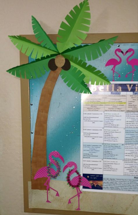 Tropical summer luau bulletin, classroom,  calendar board. Pink flamingo, palm tree, leis, Life's a beach cricut. Tropical Bulletin Board Ideas, Hawaiian Bulletin Board Ideas, Tropical Bulletin Board, Tropical Classroom Decor, Bulletin Board Tree, Beach Theme Classroom, Summer Bulletin Boards, Palm Tree Decorations, Pineapple Theme