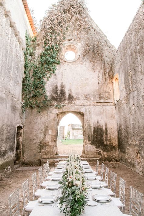 A sun-kissed vineyard ceremony, intimate wedding dinner inside romantic stone ruins, bas relief cake and modern, yet elegant bridal separates are just a few of the noteworthy details from this Portugal elopement with classic cream and blush blooms. Paired with hand-painted invitations, mother of pearl flatware and lucite dining chairs, and you have yourself some major reasons for considering a microwedding at a historic European venue. Wink wink! Bridal Boho Flowers, Ruins Wedding Decor, Ruins Wedding Venues, Ruin Wedding Venues, Castle Ruin Wedding, Wedding In Ruins, Portugal Destination Wedding, Castle Ruins Wedding, Wedding Ruins