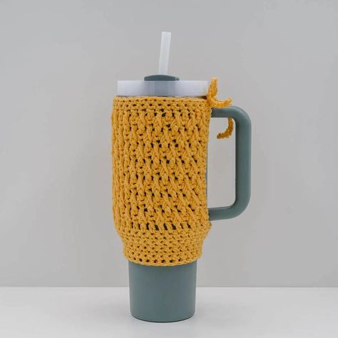 "The Stanley Cups are already incredible, but they reach a whole new level of uniqueness when adorned with a personalized crochet cozy, holder, or sleeve. The Textured Crochet Stanley Cup Cozy pattern offers a unique way to customize your Stanley Quencher, making it distinctly yours.  The fantastic news is, these crochet projects can be whipped up in no time, with most taking less than an hour to complete.  So, grab your crochet hook and embark on crafting your very own Textured Crochet Stanley Stanley Cup Crochet, Crochet Stanley Cup Holder Free Pattern, Crochet Stanley Cup Holder, Religious Christmas Crafts, 2024 Crochet, Christmas Stockings Sewing, Christmas Crafts Snowman, Knit Christmas Ornaments, Kids Christmas Coloring Pages