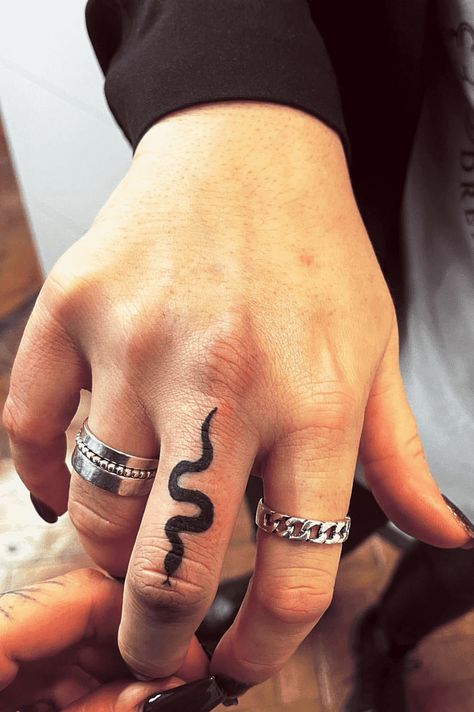 Snake Tattoos Hands, Snake On Finger Tattoo, Male Finger Tattoos, Minimalist Snake Tattoo Simple, Finger Snake Tattoo, Snake Finger Tattoo, Tattoo Ideas Finger, Men Finger Tattoos, Finger Tattoo Ideas