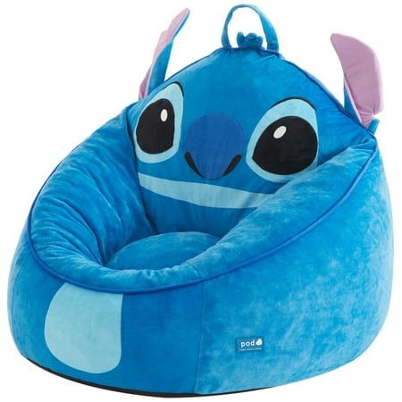 Introducing the Disney Stitch Compressed Chair for Kids in Bluea delightful fusion of comfort and character for your little one's space. Crafted with a micromink shell, this chair offers a soft, plush feel that kids adore. Filled with compressed shredded foam, it provides optimal support and coziness for hours of relaxation or play. With dimensions of 27" in width and 24" in height, it's perfectly sized for children, offering them a snug spot to sit and unwind. The inclusion of a convenient carrying handle ensures portability, allowing kids to effortlessly move their favorite chair from room to room. Whether it's story time, movie night, or simply lounging around, this Stitch-themed chair adds a touch of Disney magic to any kid's room or play area. Give your child the gift of comfort and f Stitch Room Decoration, Stitch Stuff On Amazon, Stitch Room Ideas For Kids, Cute Stitch Things, Stitch School Supplies, Disney Theme Room, Lilo And Stitch Bedroom Ideas, Stitch Themed Bedroom, Cool Toys For Kids