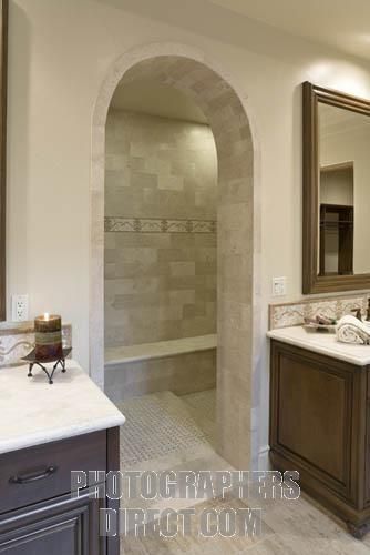 walk in shower with arched doorway instead of glass walls. Bathroom Shower With No Door Walk In, Shower Without Glass Door Walk In, Walk In Shower With Door In Middle, Walk In Shower Tunnel, Walk In Shower With Arch, Hidden Shower Walk In, Walk In Shower With Arched Entry, Shower Without Glass Door, Arched Bathroom Shower Door