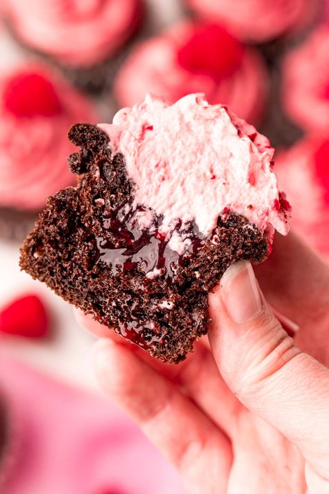 These Chocolate Raspberry Cupcakes have a raspberry-filled center that are topped with a light and fluffy raspberry vanilla cream frosting! Serve these delicious cupcakes to friends and family in under 35 minutes! Chocolate And Raspberry Cupcakes, Choc Raspberry Cupcakes, Raspberry Chocolate Lava Cupcakes, Dark Chocolate Raspberry Cupcakes, Chocolate Cupcakes Pink Frosting, Gluten Free Raspberry Cupcakes, Vanilla Cupcakes With Raspberry Filling, Cupcake Recipes Raspberry, Chocolate Cupcakes With Raspberry Filling