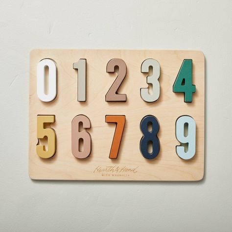 Help your little one learn their numbers with the 11-Piece Toy Numbers Peg Puzzle from Hearth & Hand™ with Magnolia. This toy numbers puzzle features colorful 1-9 numbers to help keep them engaged while making learning more fun. Made with wood in warm colors, this puzzle toy focuses on problem solving, memory and fine motor skills and looks good displayed on a shelf or table. Hearth & Hand™ with Magnolia: Gather • Create • Enjoy Wooden Puzzles For Kids, Laser Puzzle, Diy Wooden Puzzles, Engraver Projects, Montessori Games, Montessori Approach, Montessori Wooden Toys, Classical Homeschool, Diy Montessori Toys