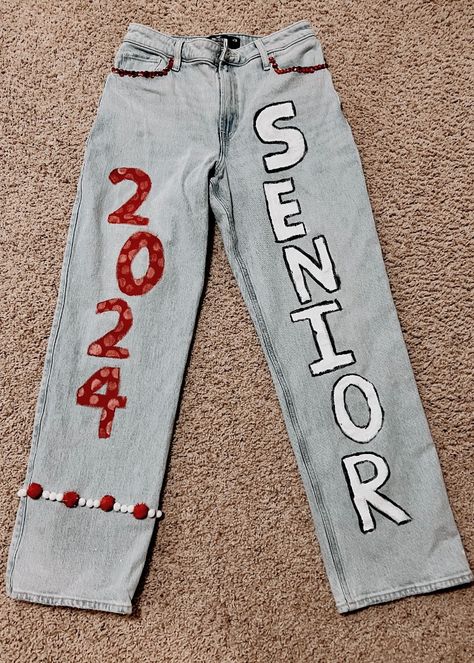 Painted and decorated jeans for the homecoming football game!!!!! #senior #highschool #homecoming #cute #seniorjeans Homecoming Jeans Painted, Highschool Homecoming, Homecoming Jeans, Decorated Jeans, Homecoming Football Game, Senior Painted Jeans, Senior Highschool, Homecoming Football, Senior Jeans