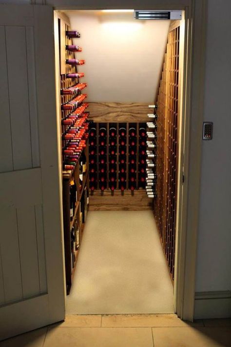 Unlock the secret to smart space use with #GoTinySpace's under-stairs wine storage! 🗝️ This hidden nook is not just a space-saver but a stylish showcase for your favorite vintages. Why settle for ordinary when you can indulge in extraordinary design? 🏡👌 Thirsty for more clever storage tips? Step right up to our blog for '12 Space-Saving Under Stairs Wine Storage Ideas'! #UnderStairsWineStorage #HomeDesign #SpaceSaver Wine Storage Basement, Wine Storage Under Stairs Staircases, Closet Wine Storage, Under Steps Wine Cellar, Wine Cupboard Under Stairs, Under The Stair Wine Cellar, Basement Wine Storage, Under The Stairs Wine Storage, Diy Wine Cellar Under Stairs