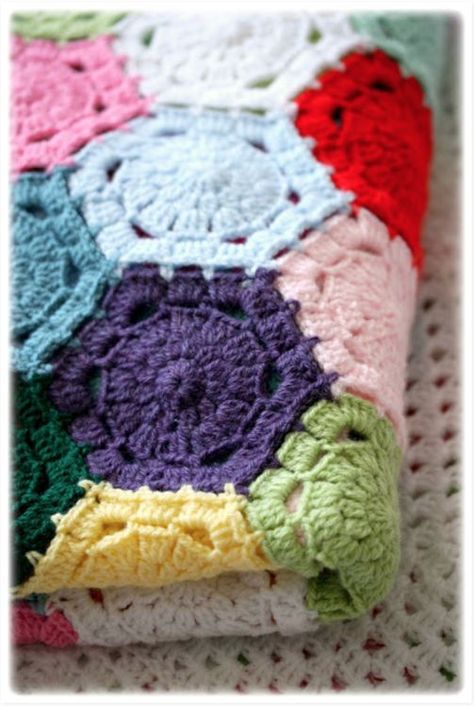 17 awesome crochet projects to finally use all that leftover yarn Left Over Yarn Crochet Blankets, Small Scrap Yarn Crochet Projects, Crochet Leftover Yarn Ideas, Crochet Scrap Yarn Blanket, Crochet Scrap Yarn Projects, Scrap Yarn Crochet Projects, Crochet Hexagon Blanket, Hexagon Blanket, Awesome Crochet