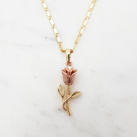 Introducing our quality Vera Rose necklace with 24K gold base & rose gold flower bud. Our quality, dainty rose necklace has been designed from scratch by Niki and her team. Made of the finest metals with a touch of rose gold on the flower bud, this piece is not only high quality but a timeless addition to your jewellery collection or gift to a loved one. Attached to a quality gold flat box chain measuring 18-20" with branded Nikita charm. Perfect for this season's trend of layering necklaces Dainty Rose Necklace, Bella Disney, Gold Rose Flower, Flower Necklace Gold, Dainty Rose, Necklace For Girlfriend, Rose Pendant, Rose Gold Pendant, Rose Necklace