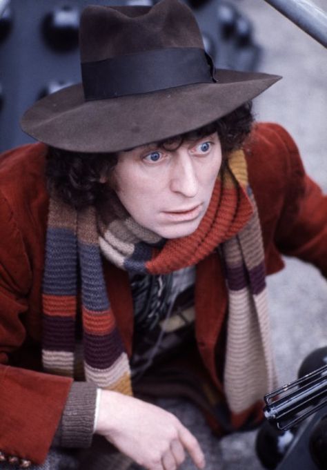 British actor Tom Baker in his best-known role as Dr Who, between two of his arch enemies, the Daleks at BBC TV Centre, London, 1974. Dr Who Tom Baker, Happy 85th Birthday, Fourth Doctor, Tv Center, Tom Baker, 4th Doctor, Classic Doctor Who, Red Wool Coat, 13th Doctor