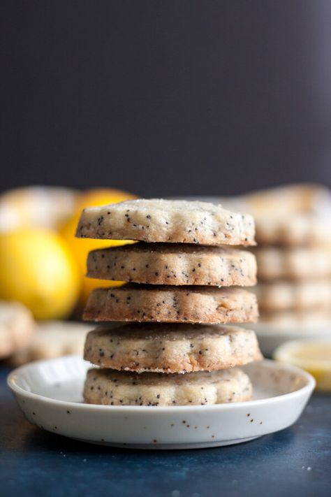 These Lemon Poppy Seed Shortbread Cookies are packed full of poppy seeds and the sweet tangy flavor of lemon. It’s the perfect bite to lift you into a happy mood. | wildwildwhisk.com #lemon #poppyseed #shortbread Poppy Seed Pound Cake, Lemon Poppy Seed Cookies, Poppy Seed Cookies, Buttery Cookie, Benefits Of Drinking Lemon Water, Lemon Water Before Bed, Seed Cookies, Lemon Health Benefits, Afternoon Tea Recipes