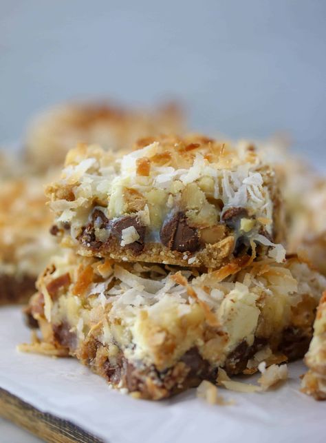 Seven Layer Bars Tates Cookies Recipe, Seven Layer Cookie Bars, 7 Layer Bar, Seven Layer Magic Bars, Seven Layer Cookies Recipe Magic Bars, Magic Bars 7 Layer, 7 Layer Bars Magic, Seven Layers Of Heaven Magic Bars, Layer Bars Recipe