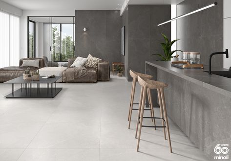 Introducing the Minoli Storm stone effect porcelain tile range, newly introduced for 2021 and available now. A subtle and stylish stone look porcelain tile, Storm is available in White, produced in 7 different formats and stocked in 3 of those sizes: 30/60 and 60/60 with a 10mm thickness and the larger stock size 90/90 with an 11mm thickness. Storm porcelain tiles display soft and slight stone effect surface patterns in neutral shades with highlights of stone-like veins. #minoli #tiles #stone Large Floor Tiles, Tiles Living Room, Tile Floor Living Room, Beautiful Backsplash, Grey Floor Tiles, Fireplace Set, Living Room Tiles, Beige Tile, Concrete Look Tile