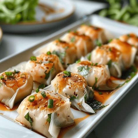 Crispy Shrimp and Chive Dumplings - Recipes, Tasks & Tools Chinese Canapes, Baked Shrimp And Chives Rice Paper Dumplings, Shrimp And Chive Dumplings, Asian Starter Recipes, Shrimp Wontons Recipes, Fancy Chinese Food, Won Tons Recipes, Chive Cakes, Dumpling Dishes